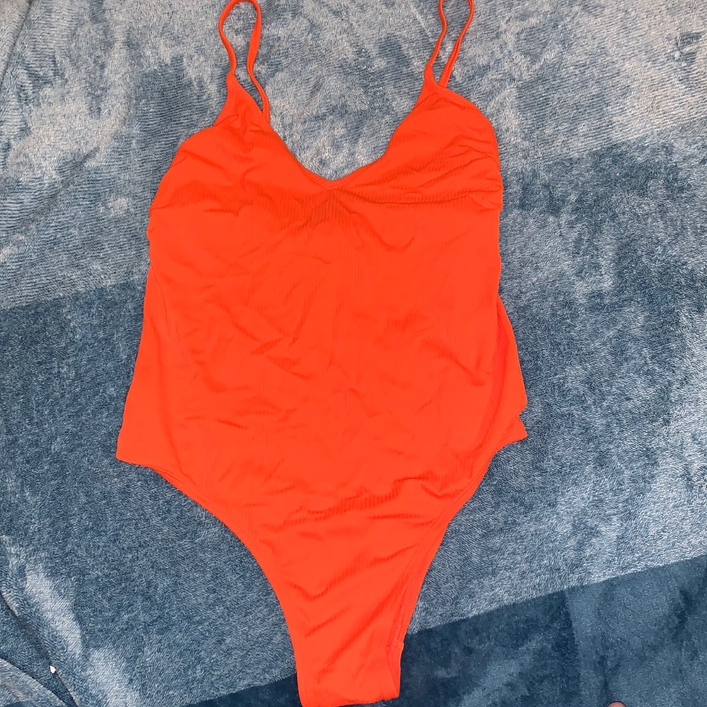 Bright orange ribbed one piece